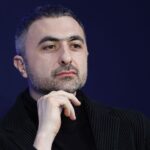 Microsoft exec says it’ll cost hundreds of billions to win in AI